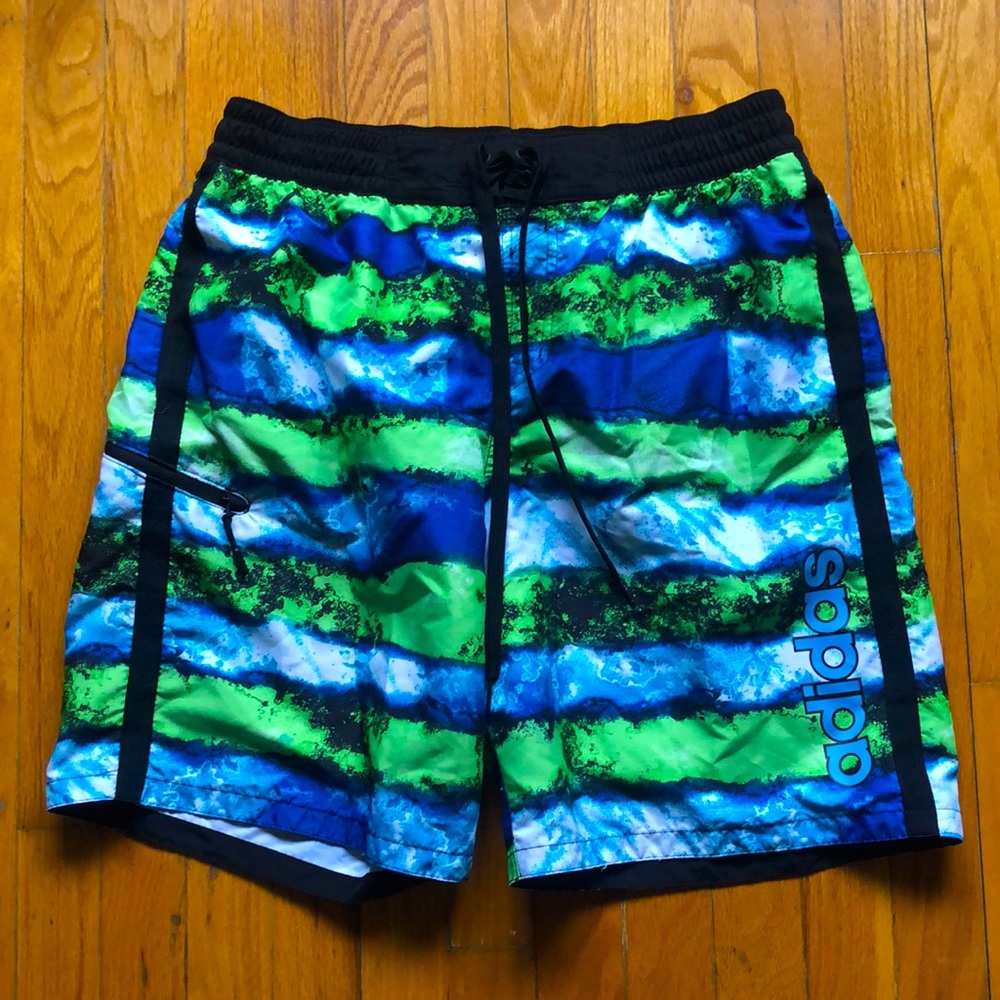 Adidas swimsuit. Mesh lining, 3 pockets, elastic waist w drawstring. Worn once!